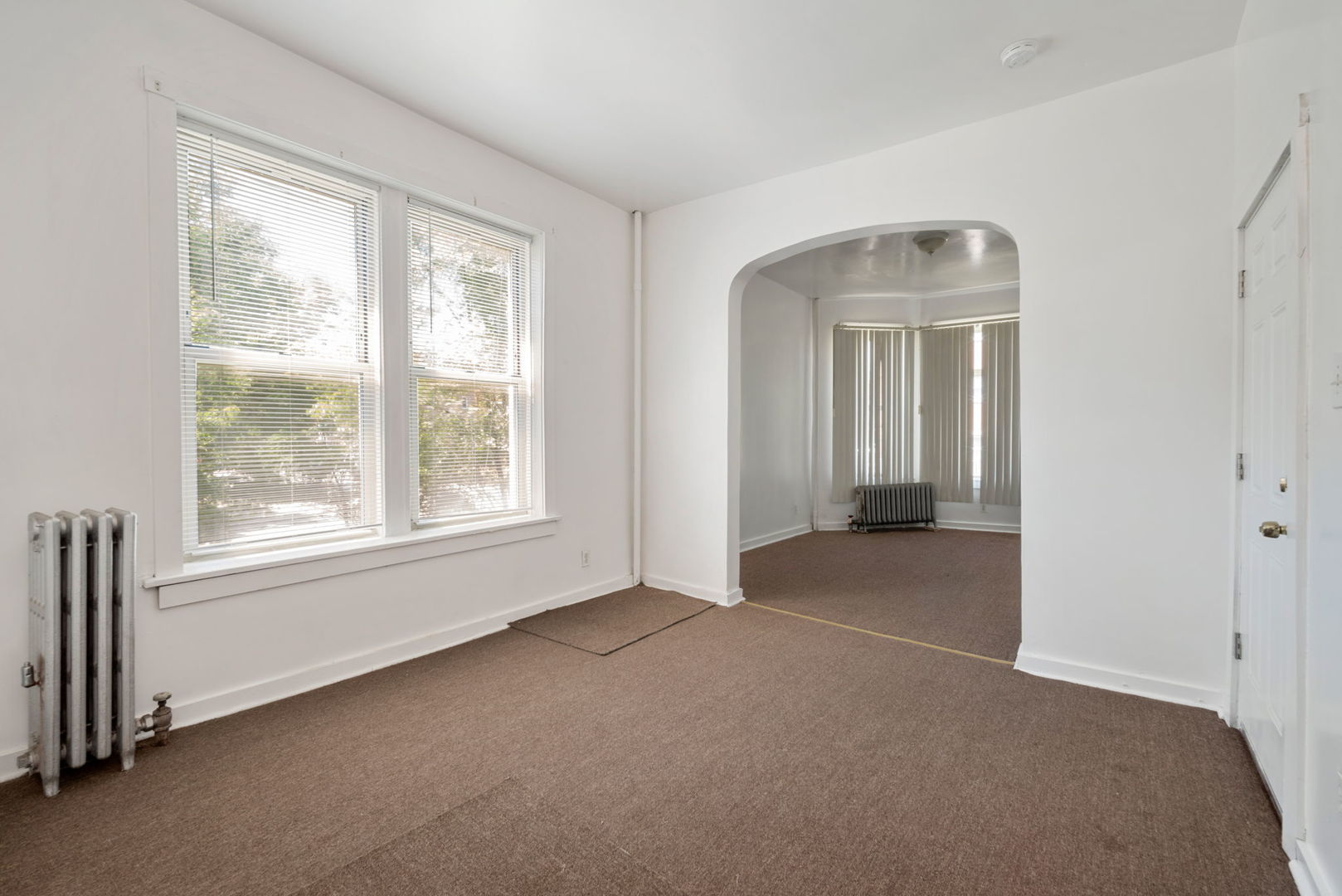 1455 South Avers Avenue Chicago, IL 60623 - Photo 4 of 22 an empty room with windows and closet
