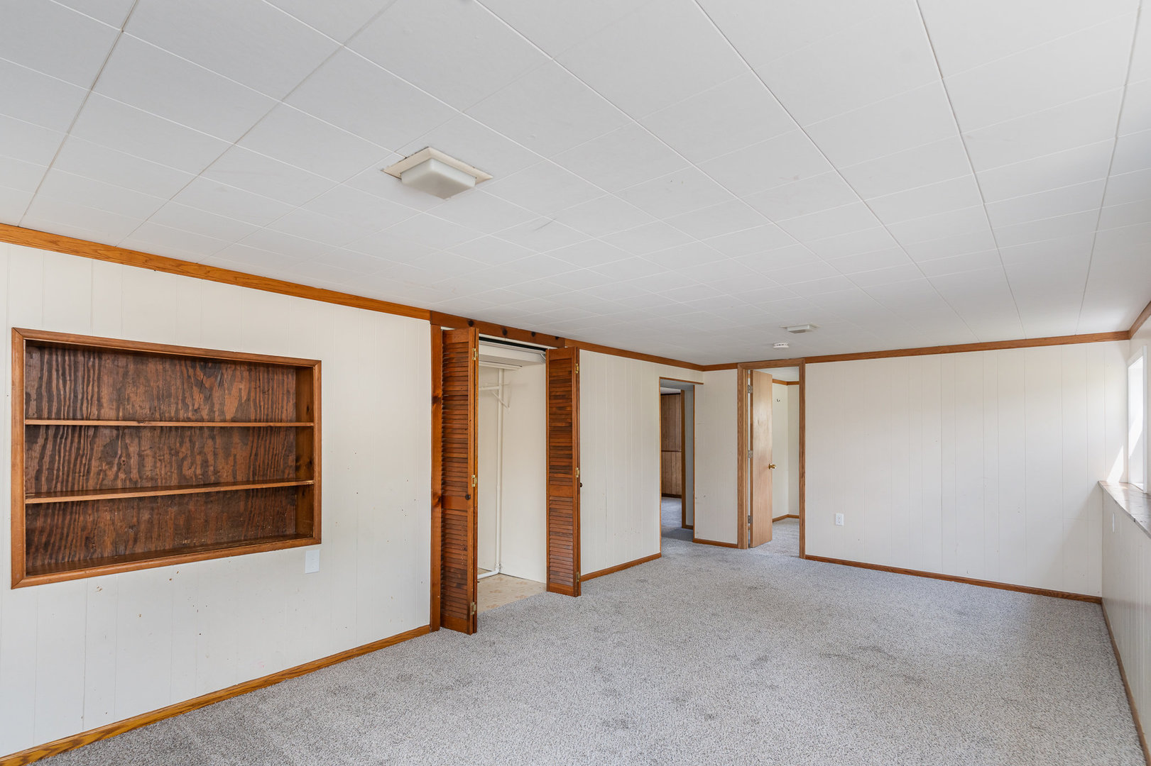 138 Cedar Circle Streamwood, IL 60107 - Photo 10 of 15 a view of an empty room with a window