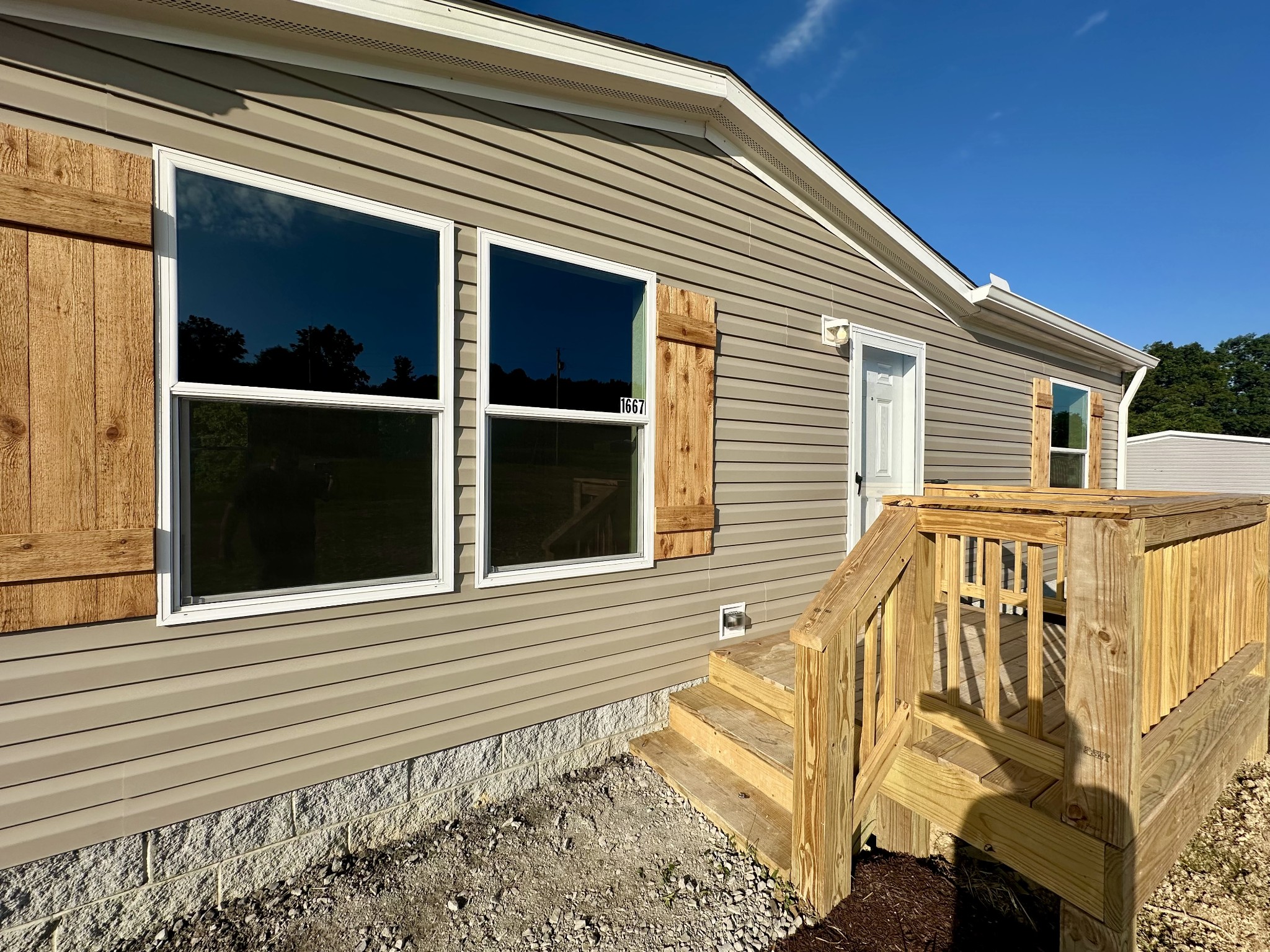 1667 Rabe Coats Road Westmoreland, TN 37186 - Photo 2 of 20 a view of a house with a door