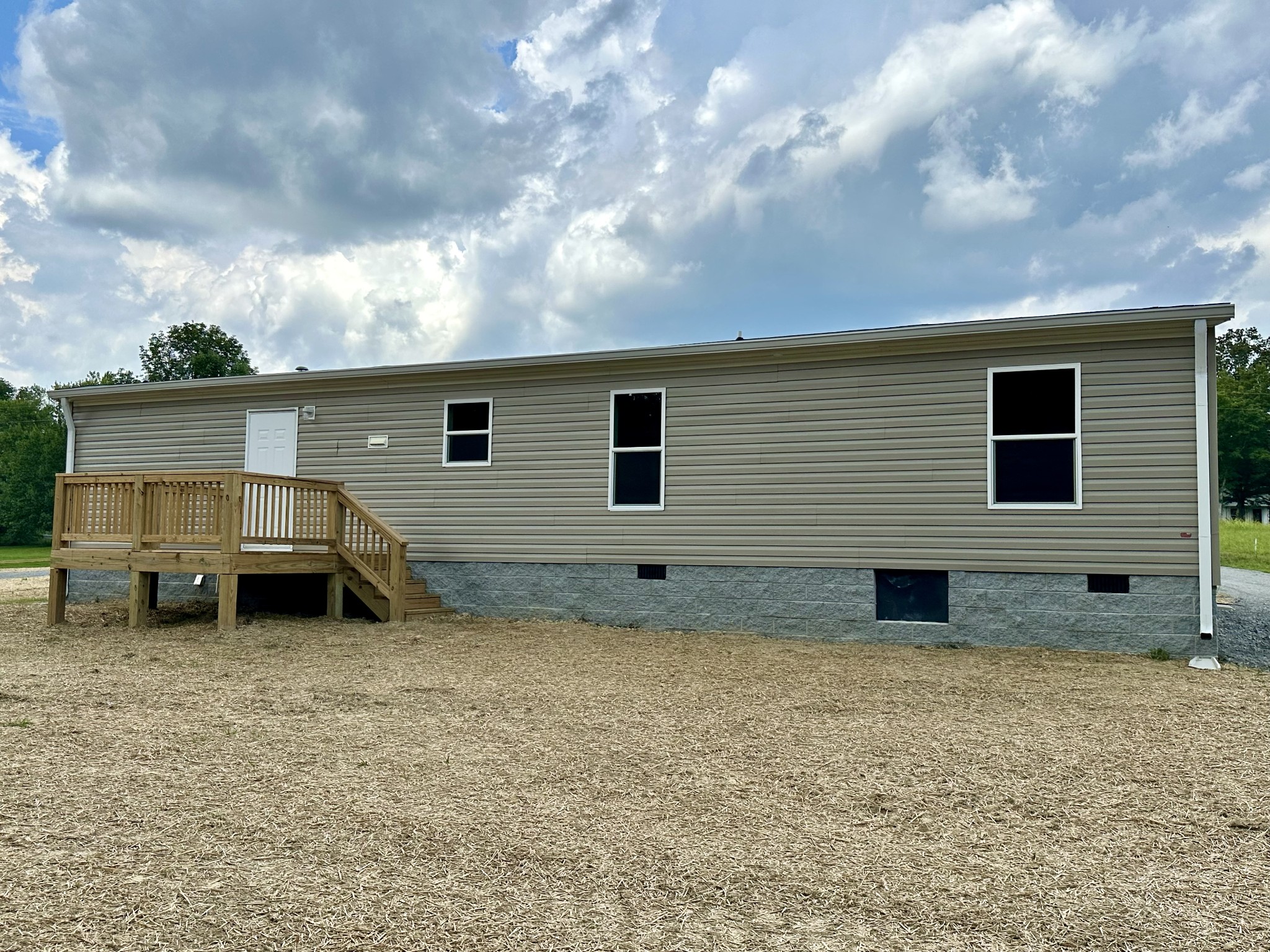 1667 Rabe Coats Road Westmoreland, TN 37186 - Photo 9 of 20 a view of a house with a yard