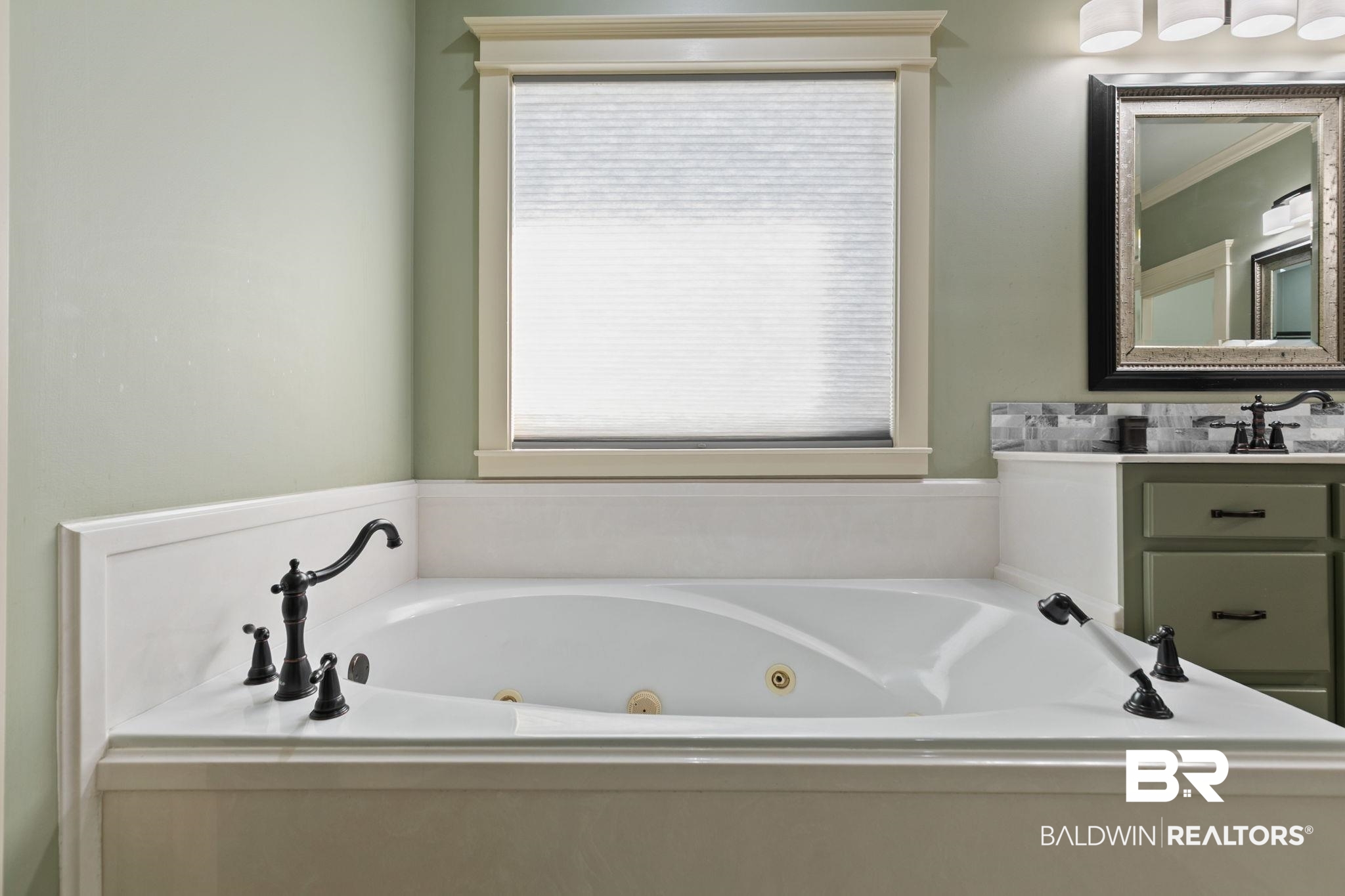 9584 Sanibel Loop Daphne, AL 36526 - Photo 27 of 48 Full bathroom featuring a jetted tub, vanity, and ornamental molding