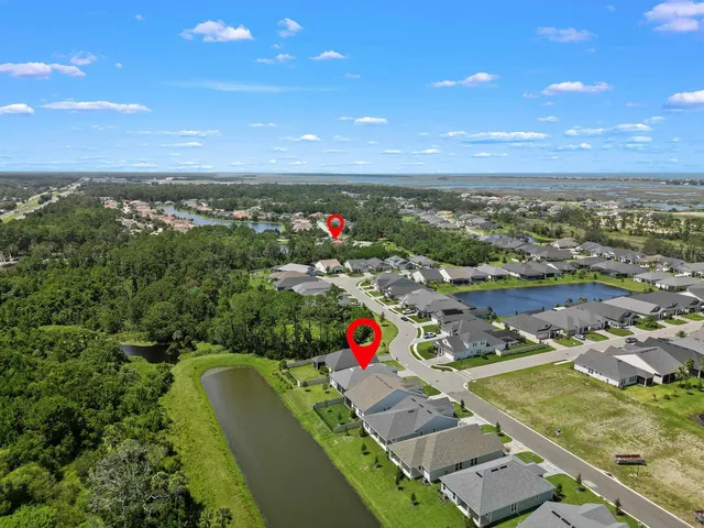 a view of a lake with houses