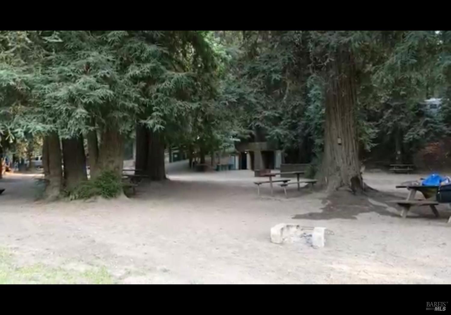 a view of swimming pool with a bench in patio
