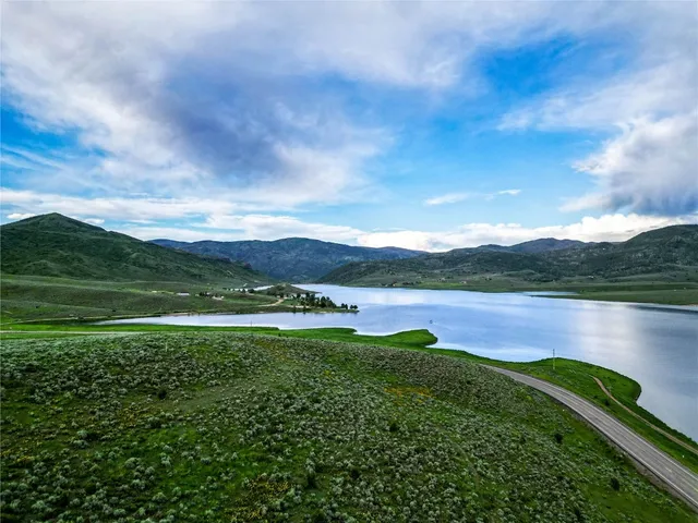 a view of a lake with a city