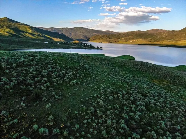 a view of lake with mountain