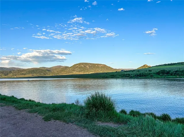 a view of a lake from a yard