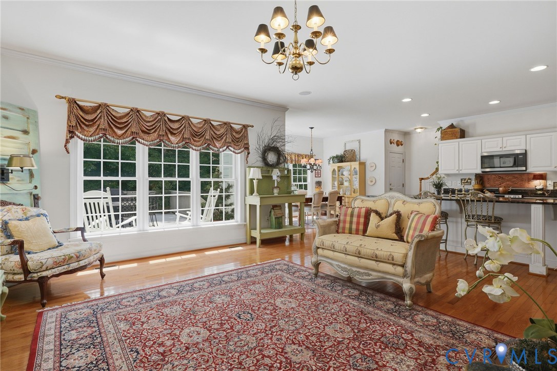13424 Tipple Point Road Midlothian, VA 23114 - Photo 20 of 53 a living room with furniture and a large window