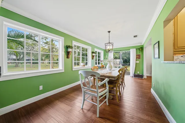 a spacious bathroom with a sink double vanity and a mirror