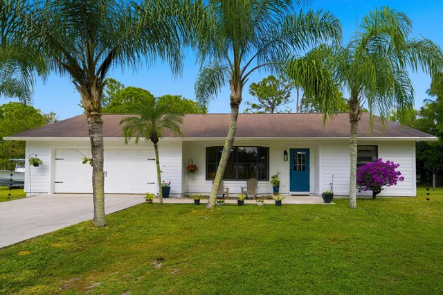 a front view of house with yard