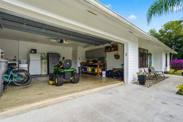 a view of house with outdoor seating