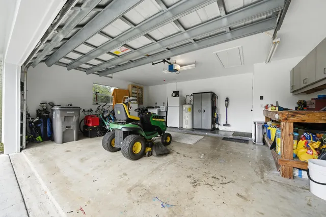 a view of a backyard with sitting area