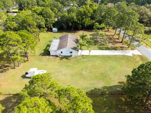 a view of a lake with a building in the background