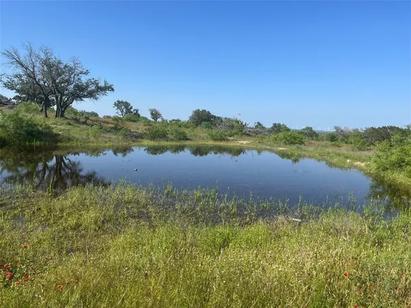 a view of lake and mountain