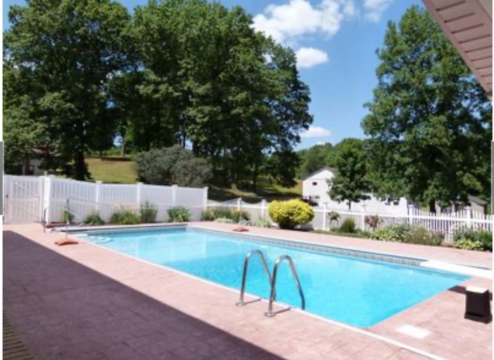 612 College Lodge Road Indiana, PA 15701 - Photo 14 of 31 a view of a swimming pool with a patio