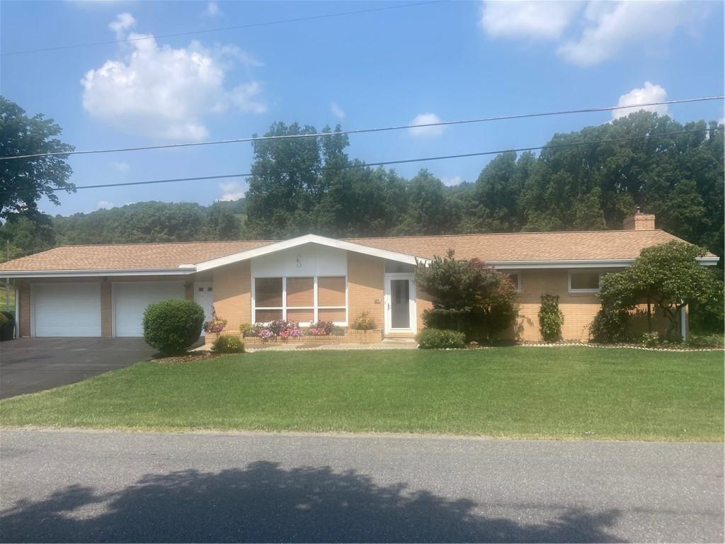 612 College Lodge Road Indiana, PA 15701 - Photo 17 of 31 a front view of a house with a yard