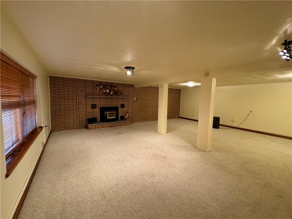 612 College Lodge Road Indiana, PA 15701 - Photo 7 of 31 a view of an empty room with a fireplace
