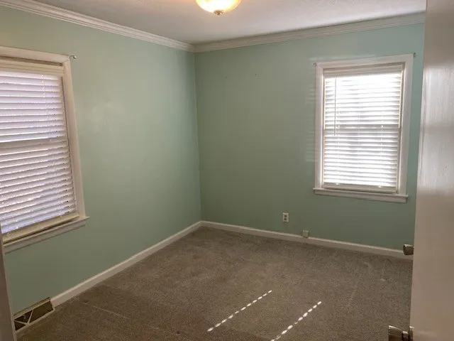a bathroom with a sink toilet and vanity
