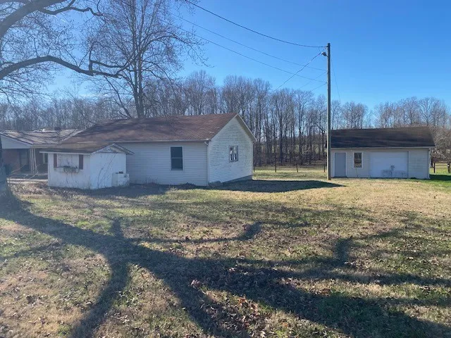 a house view with a backyard space