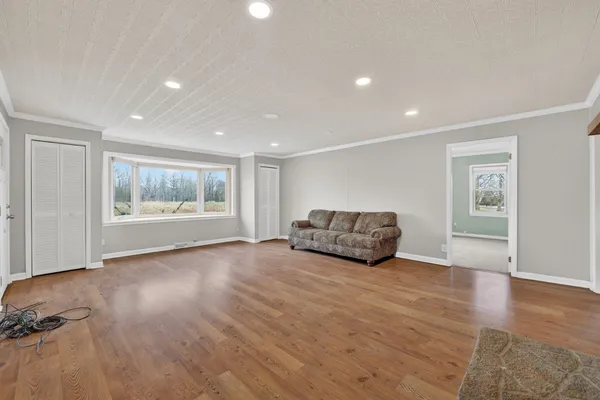 a living room with furniture and window
