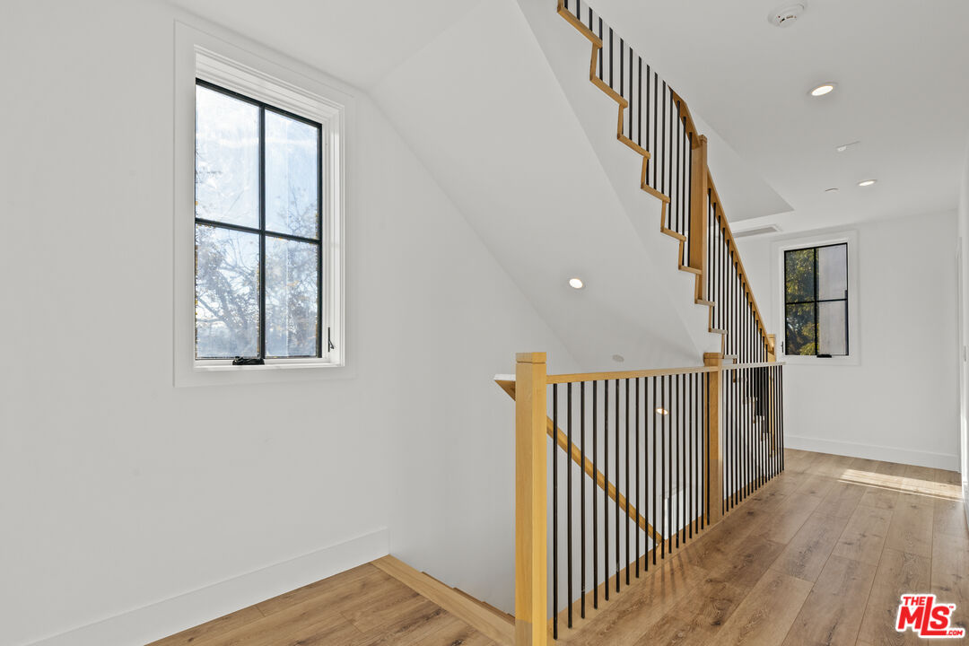 5536 Tova Road Sherman Oaks, CA 91411 - Photo 6 of 15 a view of staircase with railing and a window