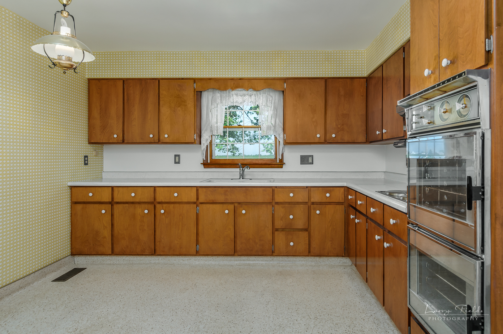 4682 East 29th Road Sandwich, IL 60548 - Photo 5 of 18 a kitchen with stainless steel appliances granite countertop a sink dishwasher a stove and a refrigerator with cabinets