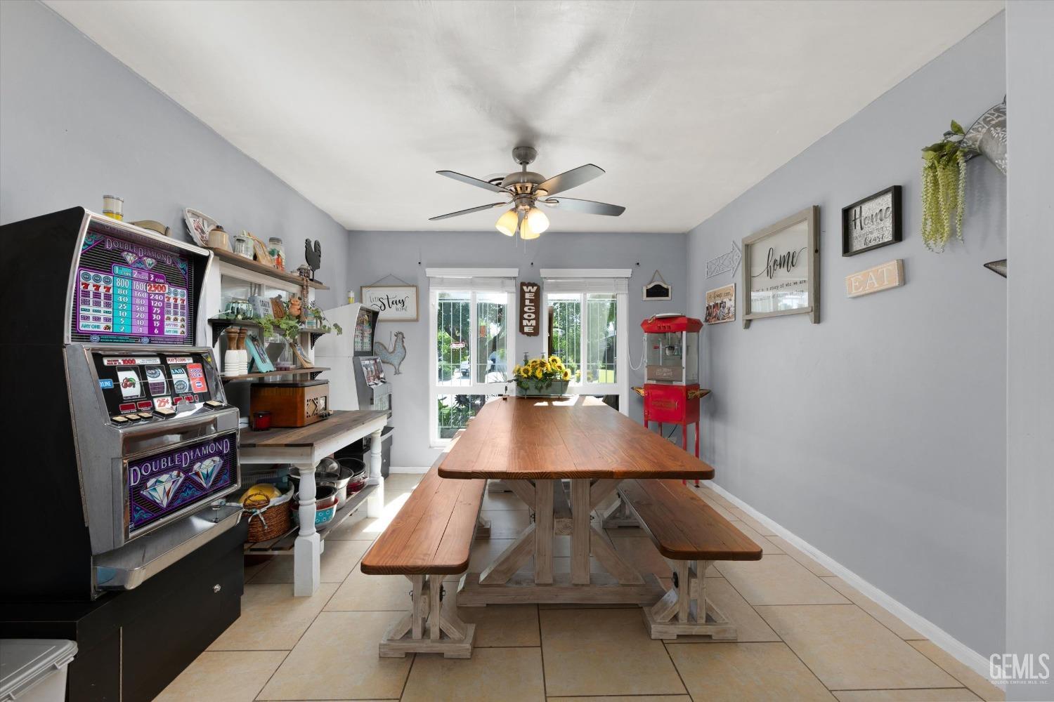 Undisclosed Address Bakersfield, CA 93309 - Photo 13 of 33 a room with lots of furniture and white walls