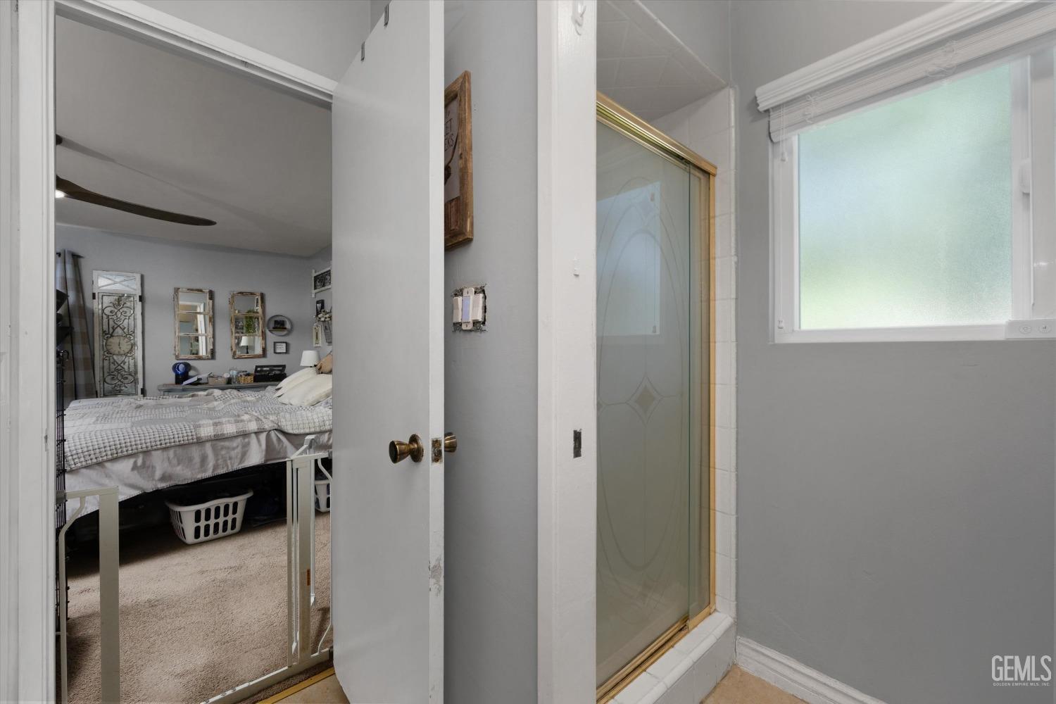 Undisclosed Address Bakersfield, CA 93309 - Photo 26 of 33 a bathroom with a sink and a mirror