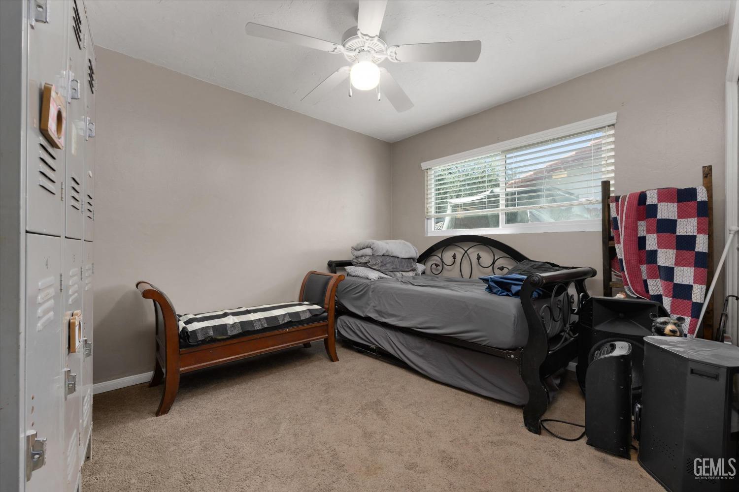 Undisclosed Address Bakersfield, CA 93309 - Photo 27 of 33 a bedroom with bed and window