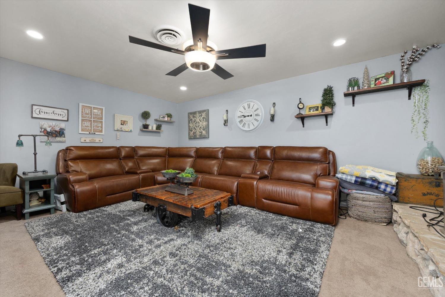 Undisclosed Address Bakersfield, CA 93309 - Photo 8 of 33 a living room with furniture and a view of kitchen