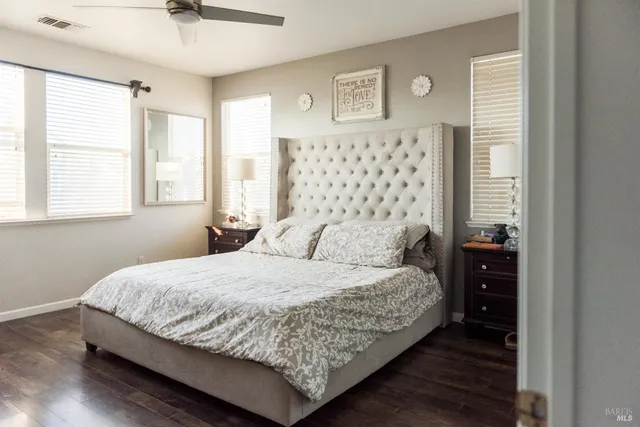 a large bathroom with a sink a mirror and a vanity