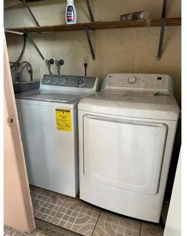 a utility room with dryer and washer