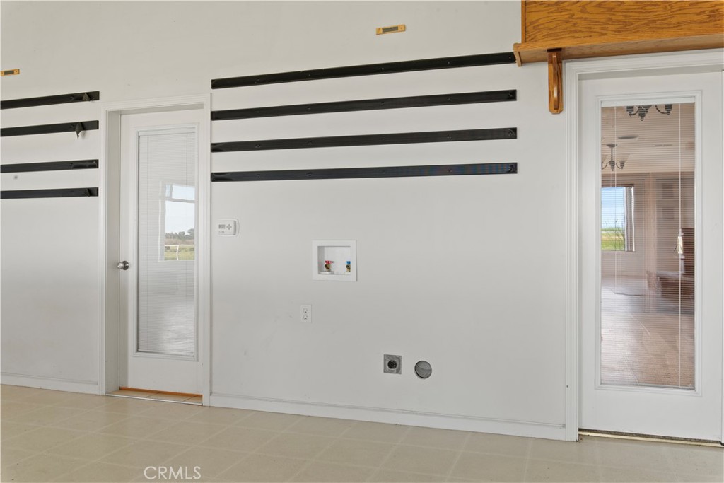 6922 G Street Merced, CA 95340 - Photo 22 of 39 a view of a walk in closet