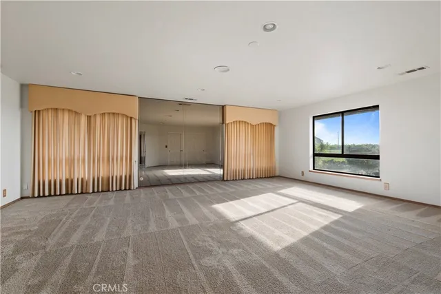 a view of a livingroom with a staircase