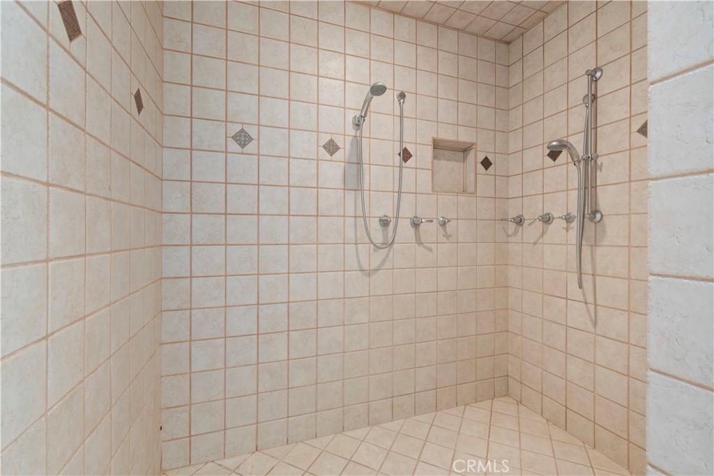 6922 G Street Merced, CA 95340 - Photo 28 of 39 a bathroom with a shower