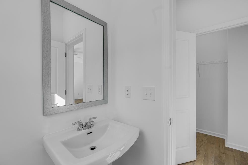 6117 Wayburn Street Tucker, GA 30084 - Photo 18 of 48 a bathroom with a sink and a mirror