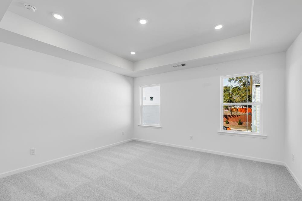 6117 Wayburn Street Tucker, GA 30084 - Photo 20 of 48 an empty room with windows and closet
