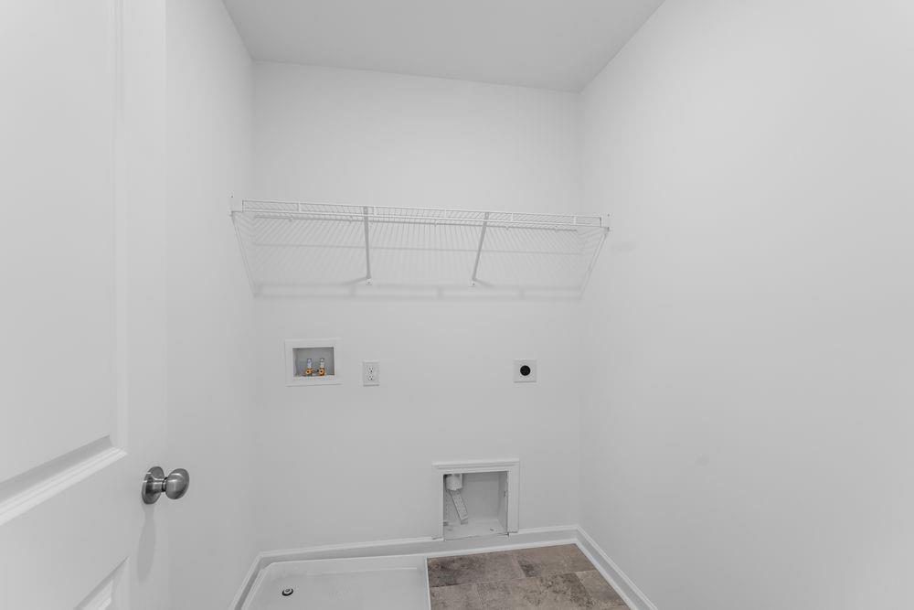 6117 Wayburn Street Tucker, GA 30084 - Photo 31 of 48 a view of small space with racks on the wall