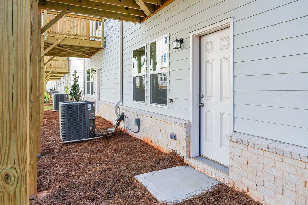 6117 Wayburn Street Tucker, GA 30084 - Photo 34 of 48 a view of an entryway with a front door