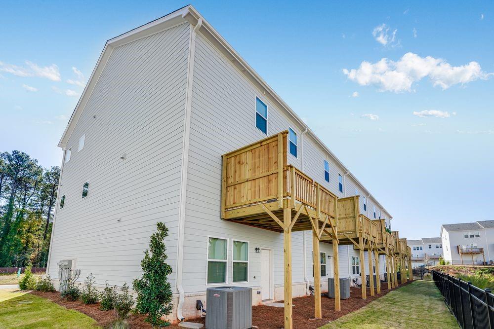 6117 Wayburn Street Tucker, GA 30084 - Photo 36 of 48 a view of a house with a yard