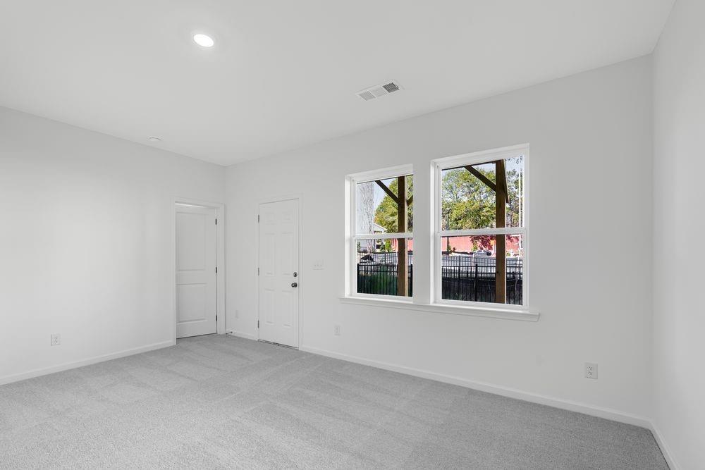 6117 Wayburn Street Tucker, GA 30084 - Photo 4 of 48 an empty room with windows