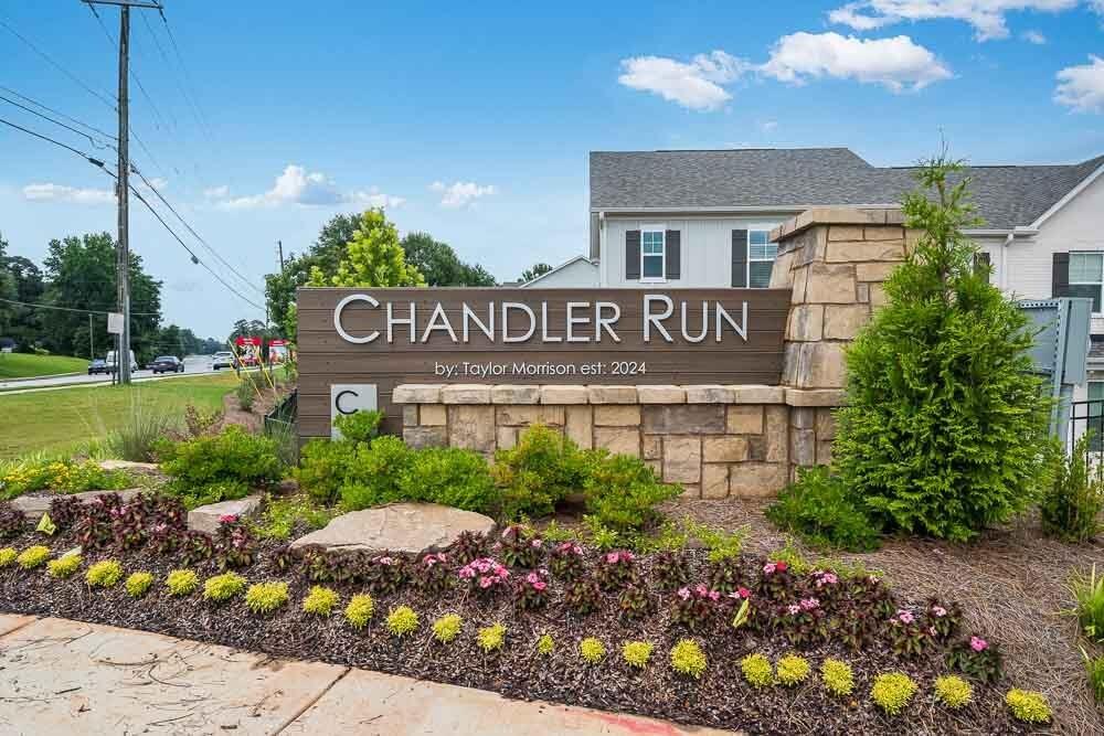 6117 Wayburn Street Tucker, GA 30084 - Photo 42 of 48 a sign that is sitting in front of a house