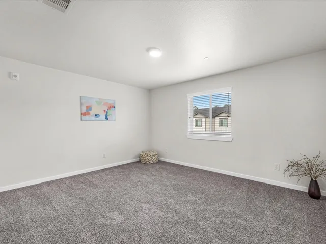 an empty room with a bathroom