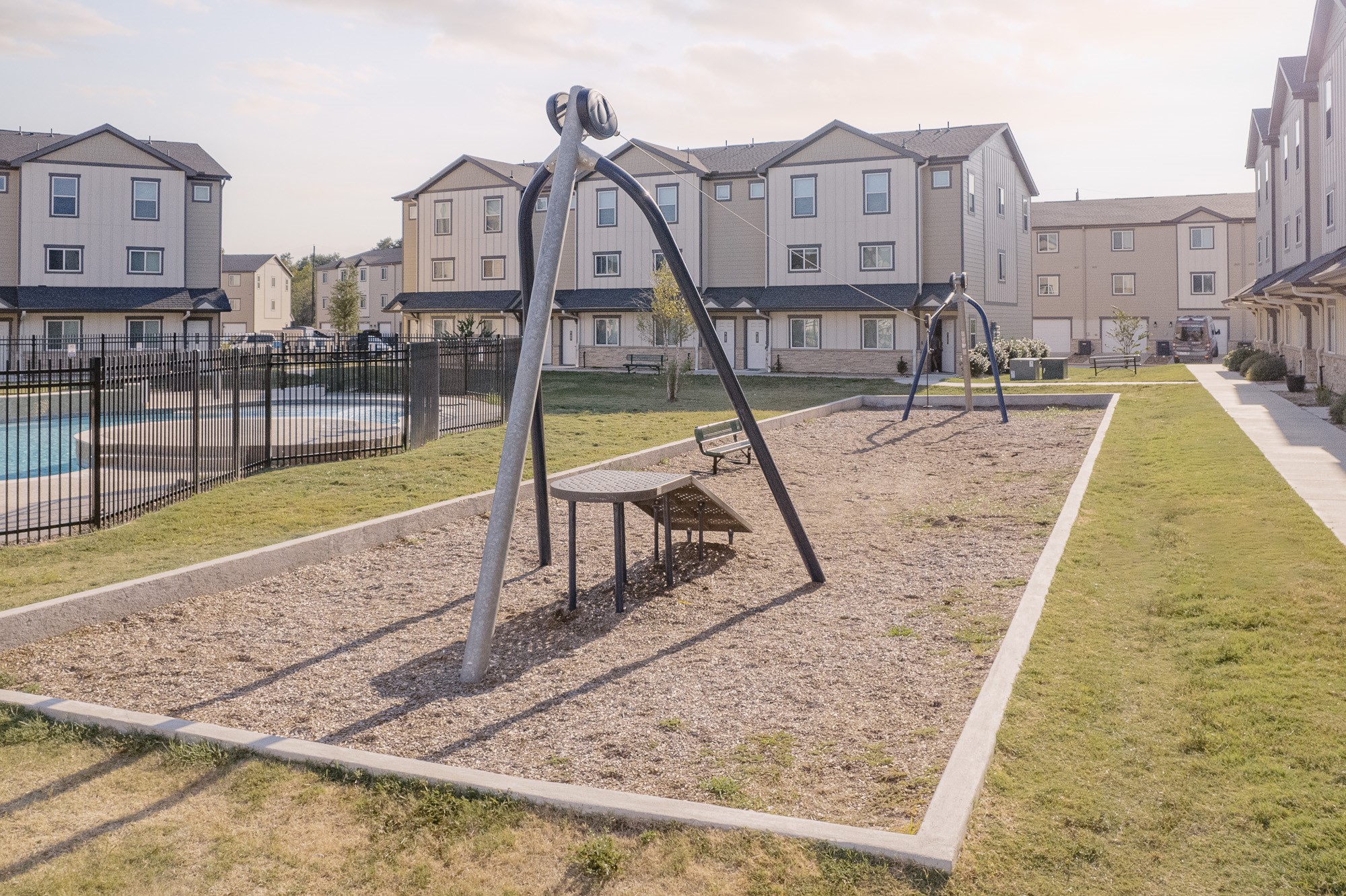 12603 Telge Road, Unit 29A Cypress, TX 77429 - Photo 24 of 31 a view of a swimming pool with a lounge chairs