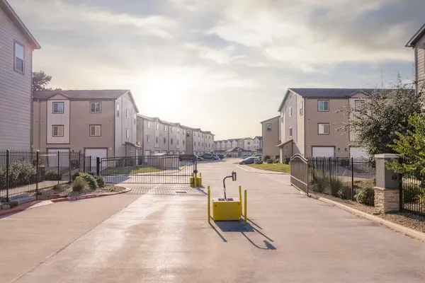 a view of a swimming pool with a lounge chairs
