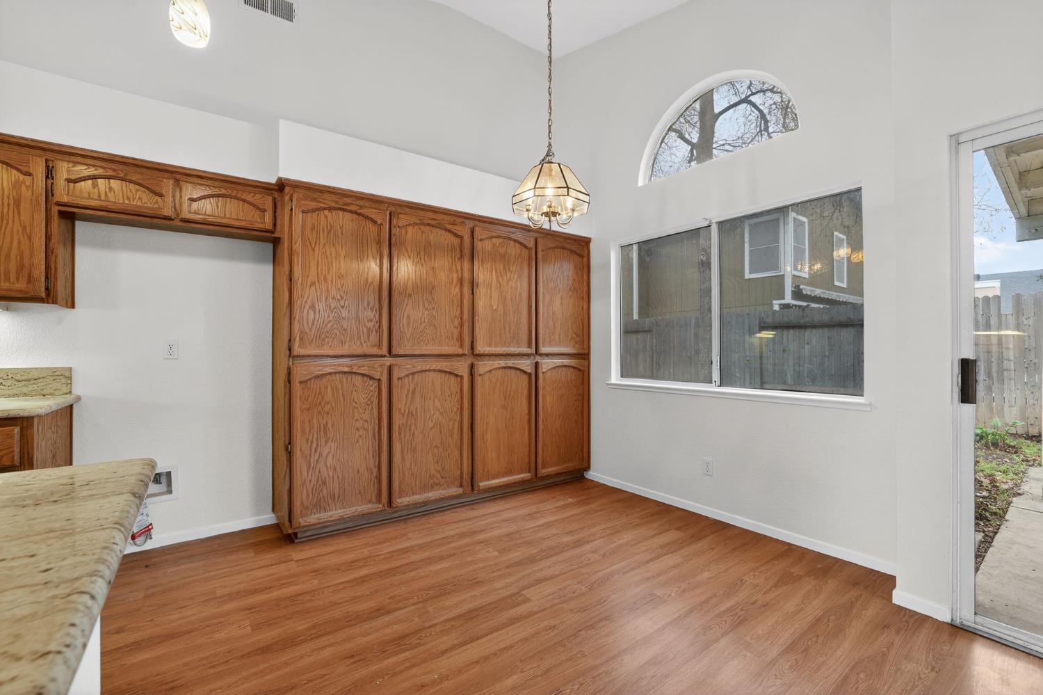 8425 Morning Skye Way Antelope, CA 95843 - Photo 15 of 42 a view of a entrance and room with wooden floor