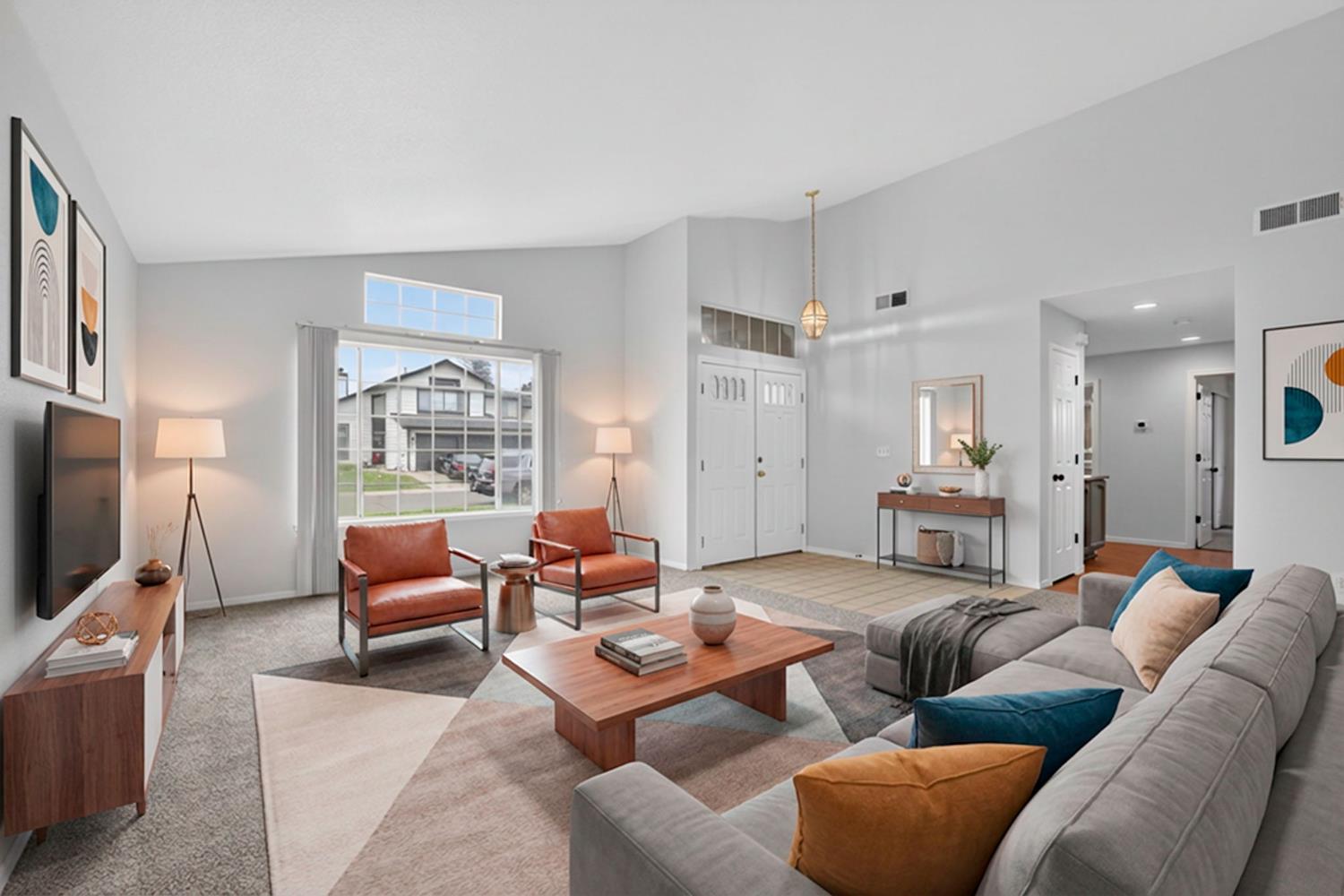 8425 Morning Skye Way Antelope, CA 95843 - Photo 5 of 42 a living room with furniture and a flat screen tv