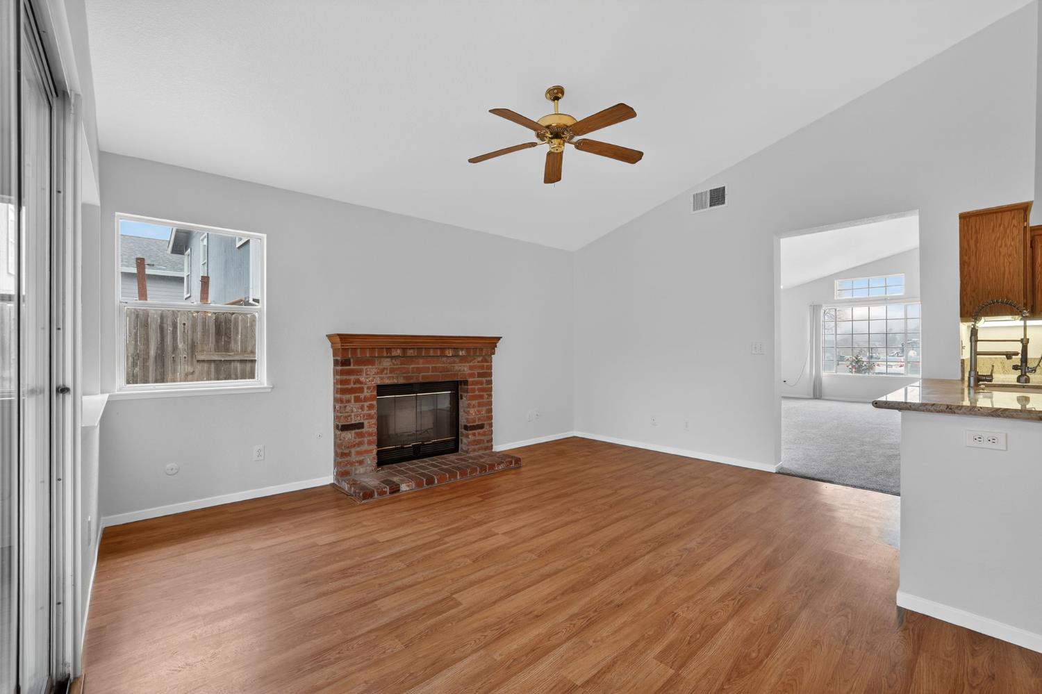 8425 Morning Skye Way Antelope, CA 95843 - Photo 10 of 42 a view of empty room with wooden floor and window