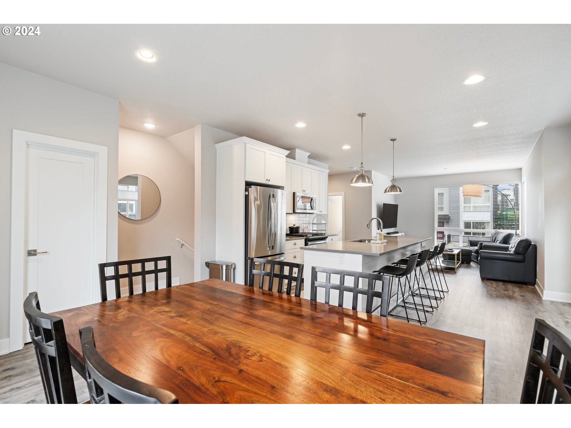 17136 Southwest Woodpecker Lane Beaverton, OR 97007 - Photo 16 of 34 a view of kitchen dining table and chairs