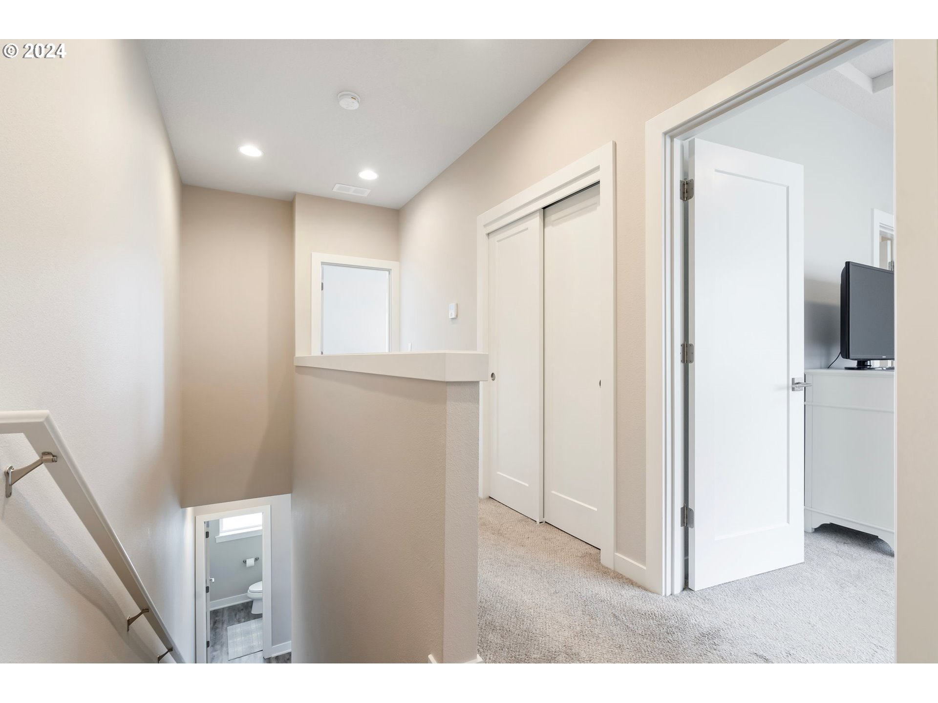 17136 Southwest Woodpecker Lane Beaverton, OR 97007 - Photo 28 of 34 a view of hallway with kitchen view
