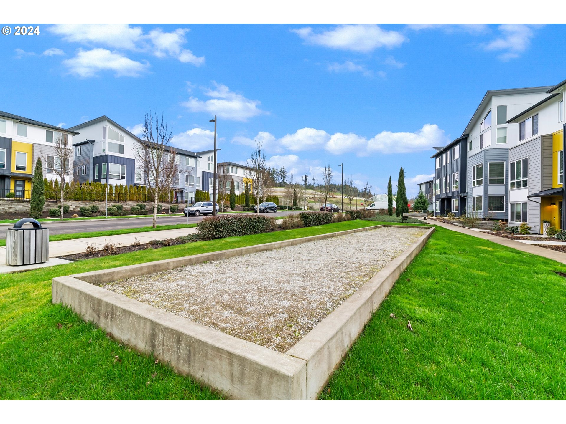 17136 Southwest Woodpecker Lane Beaverton, OR 97007 - Photo 34 of 34 a view of a big yard in front of a building